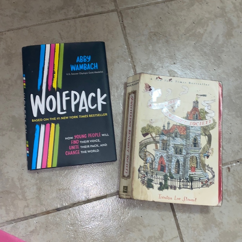 Two books. Wolfpack and the mysterious Benedict society
